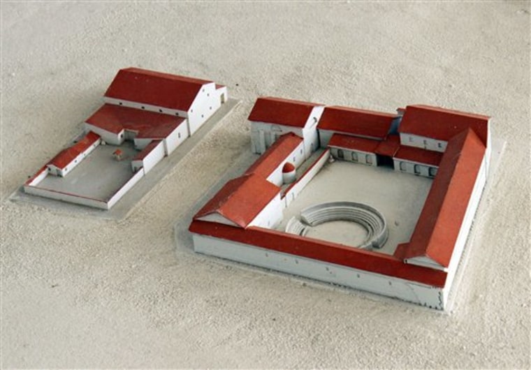 A model of a Roman gladiator school found with a underground radar in Carnuntum, Austria, is presented at a news conference by the Ludwig Bolzmann institute for archaeology in Carnuntum on Monday. They lived in cells barely big enough to turn around in for the time allotted them until death; usually four or five battles in the arena. 